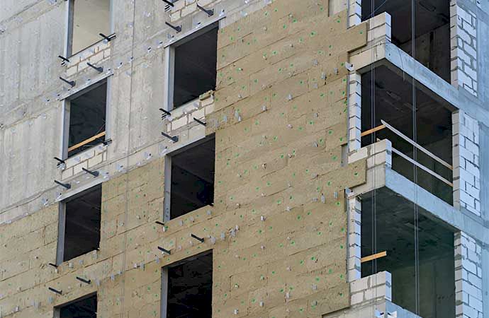 Prix d’une isolation extérieure pour 100 m² en Suisse romande selon la technique utilisée